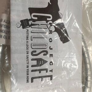 GUN SAFETY LOCKS. Comes with keys and instructions.